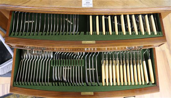 A canteen of Old English pattern plated A1 cutlery housed in walnut two drawer standing chest	